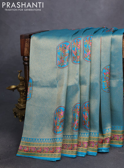 Banarasi silk saree teal blue with position prints and printed border