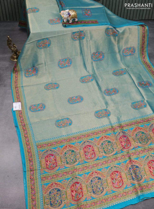 Banarasi silk saree teal blue with position prints and printed border