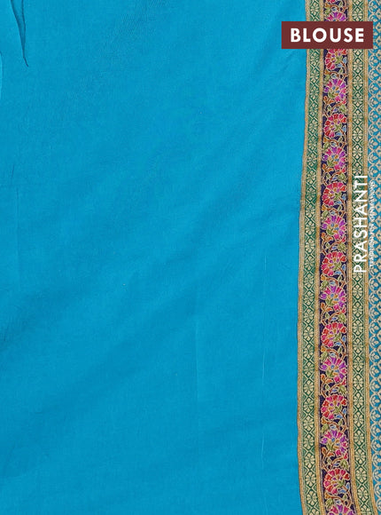 Banarasi silk saree teal blue with position prints and printed border