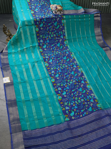 Semi mysore crepe saree blue and teal green with panel prints and long zari woven border