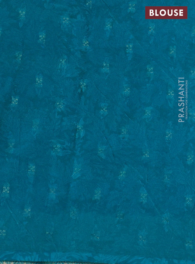 Semi mysore crepe saree teal blue and blue with panel prints and long zari woven border