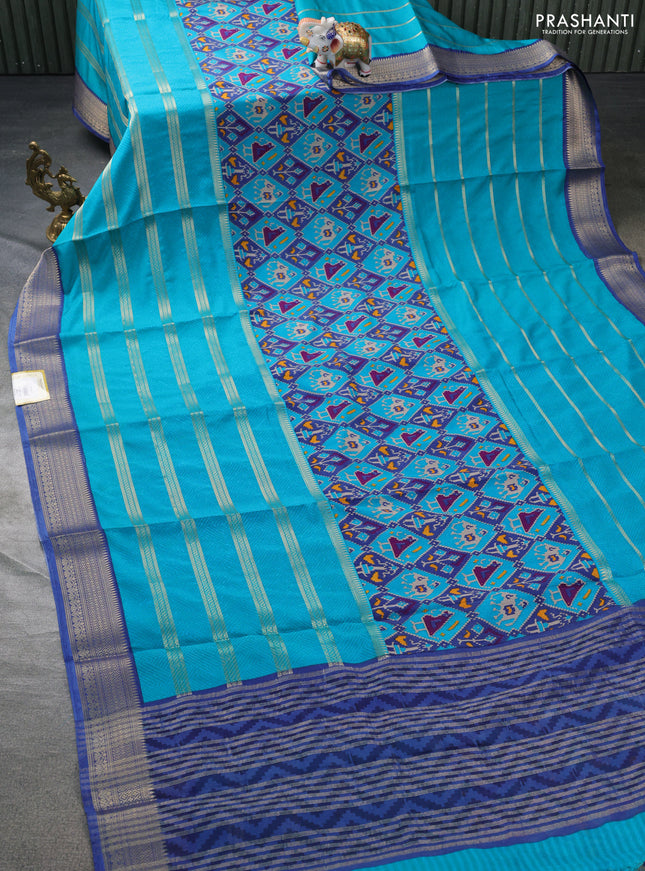 Semi mysore crepe saree blue and teal blue with panel prints and long zari woven border