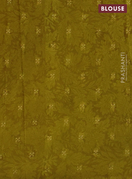 Semi mysore crepe saree beige and sap green with panel prints and long zari woven border