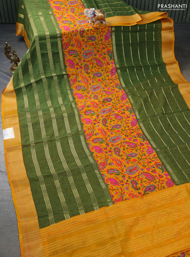 Semi mysore crepe saree mustard yellow and sap green with panel prints and long zari woven border