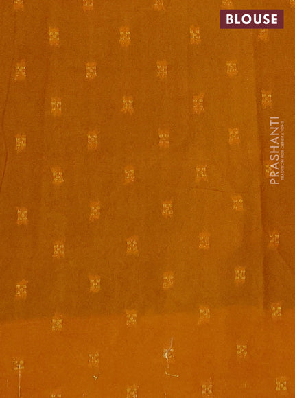 Semi mysore crepe saree mustard yellow and sap green with panel prints and long zari woven border
