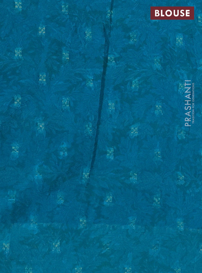 Semi mysore crepe saree teal blue and blue with panel prints and long zari woven border