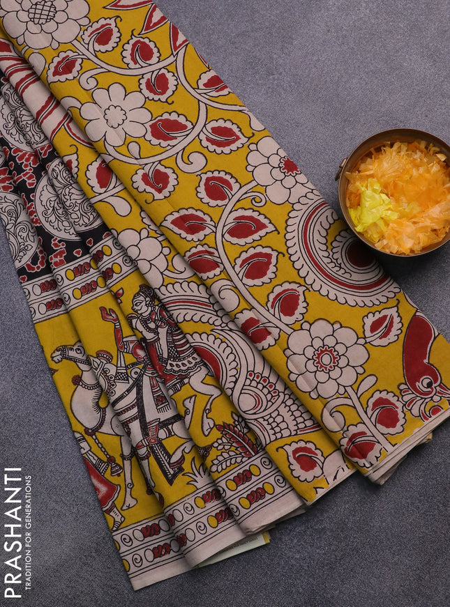 Kalamkari cotton saree black and yellow with allover prints and long printed border