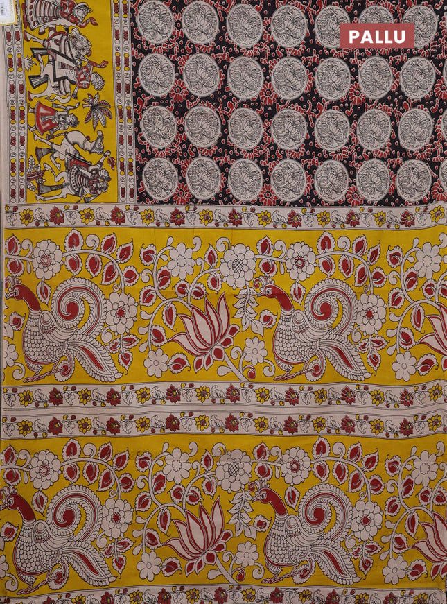 Kalamkari cotton saree black and yellow with allover prints and long printed border