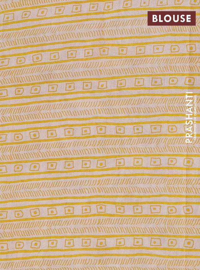 Kalamkari cotton saree black and yellow with allover prints and long printed border