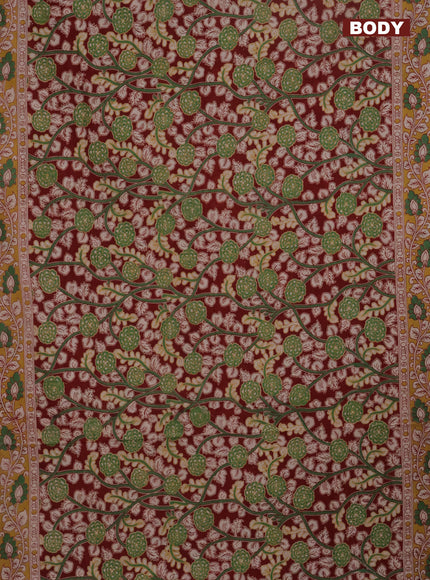 Kalamkari cotton saree maroon and mustard shade with allover prints and printed border