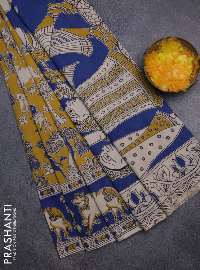 Kalamkari cotton saree mustard yellow and blue with allover prints and printed border
