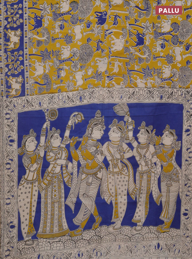 Kalamkari cotton saree mustard yellow and blue with allover prints and printed border