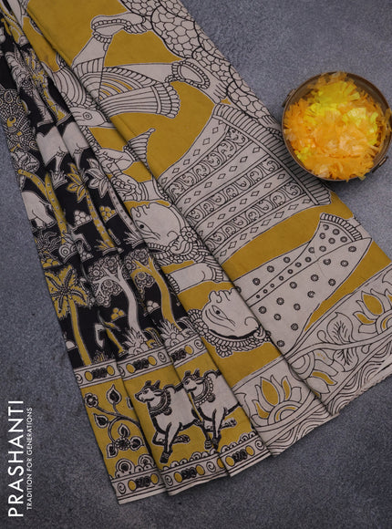 Kalamkari cotton saree black and yellow with allover prints and printed border