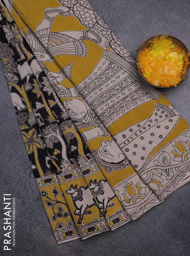 Kalamkari cotton saree black and yellow with allover prints and printed border