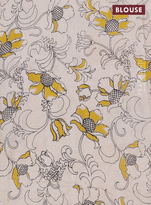 Kalamkari cotton saree black and yellow with allover prints and printed border