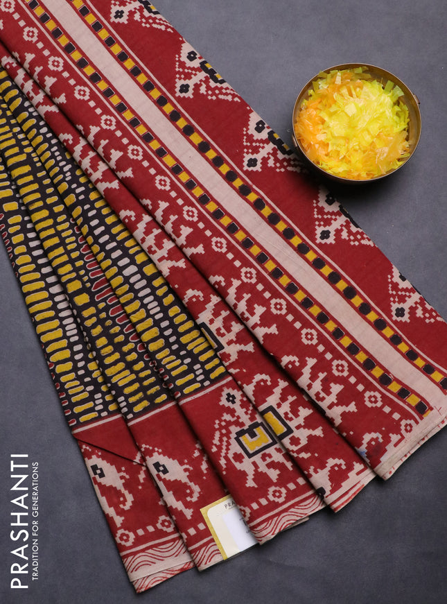 Kalamkari cotton saree black and maroon with allover prints and printed border
