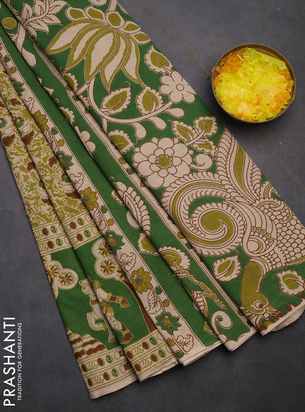 Kalamkari cotton saree light green and green with allover prints and printed border