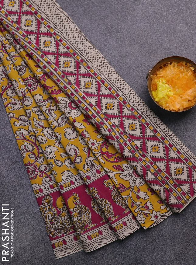 Kalamkari cotton saree yellow and magenta pink with allover prints and printed border