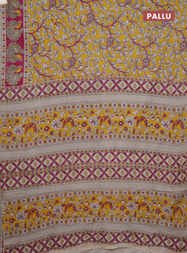 Kalamkari cotton saree yellow and magenta pink with allover prints and printed border