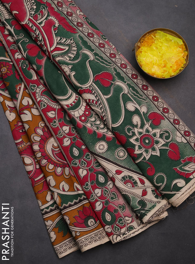 Kalamkari cotton saree dark green and dark mustard with allover prints and printed border