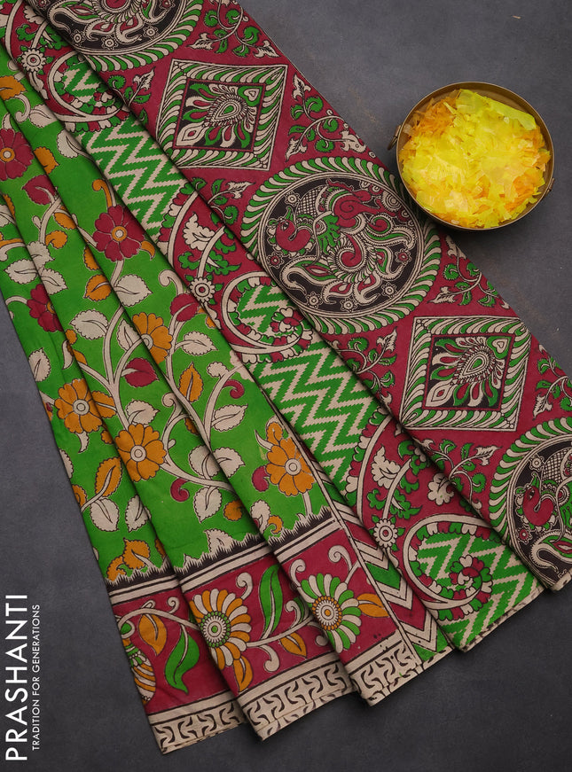 Kalamkari cotton saree parrot green and dark pink with allover prints and printed border