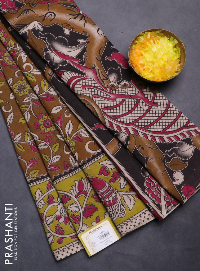 Kalamkari cotton saree dark mustard and light green with allover prints and printed border