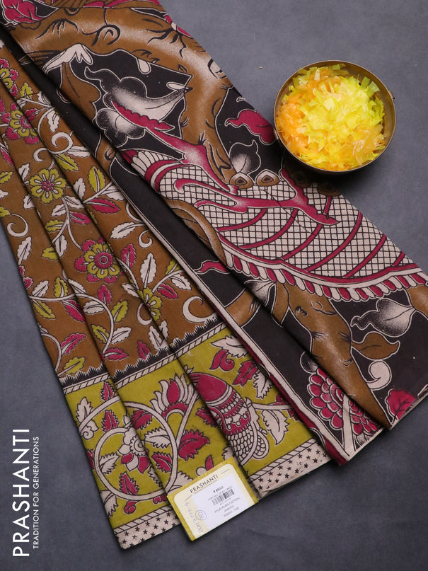 Kalamkari cotton saree dark mustard and light green with allover prints and printed border