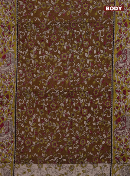 Kalamkari cotton saree dark mustard and light green with allover prints and printed border