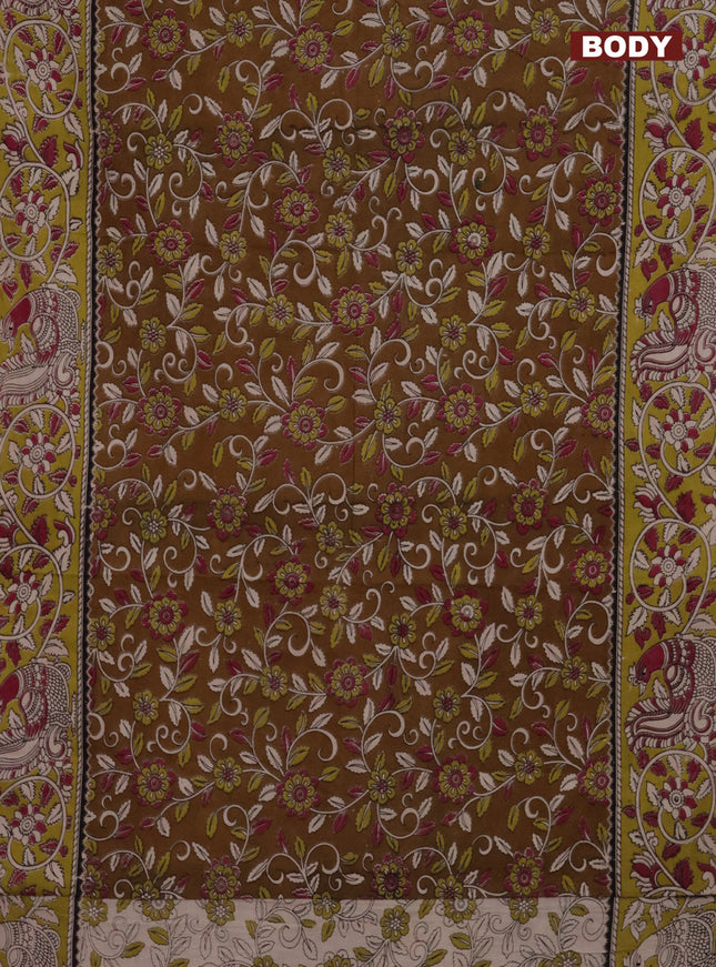 Kalamkari cotton saree dark mustard and light green with allover prints and printed border