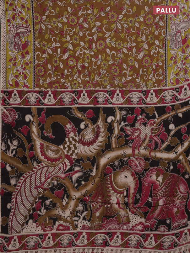 Kalamkari cotton saree dark mustard and light green with allover prints and printed border