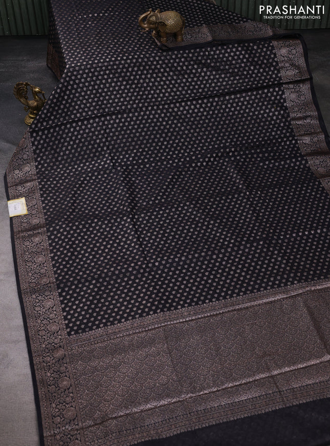 Semi chiniya silk saree black with allover zari woven buttas and zari woven border