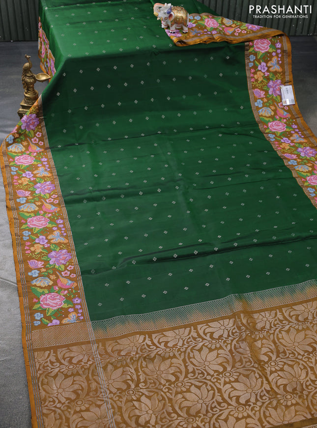 Pure soft silk saree green and dark mustard with allover silver zari woven buttas and zari woven embroidery work border