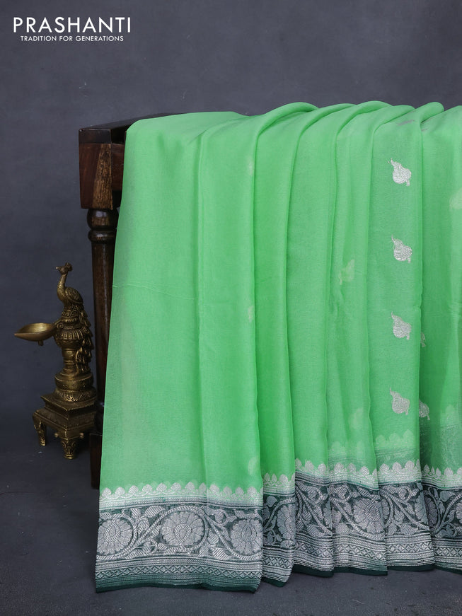 Banarasi chiffon silk saree light green and bottle green with silver zari woven buttas and floral silver zari woven border