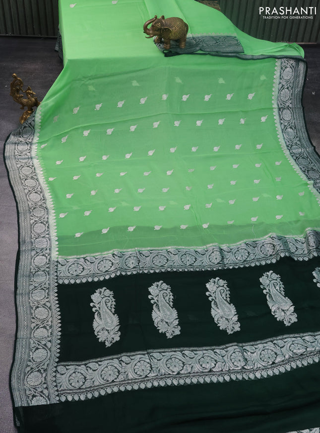 Banarasi chiffon silk saree light green and bottle green with silver zari woven buttas and floral silver zari woven border