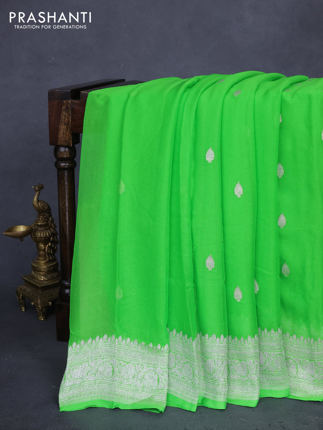 Banarasi chiffon silk saree light green with silver zari woven buttas and silver zari woven border