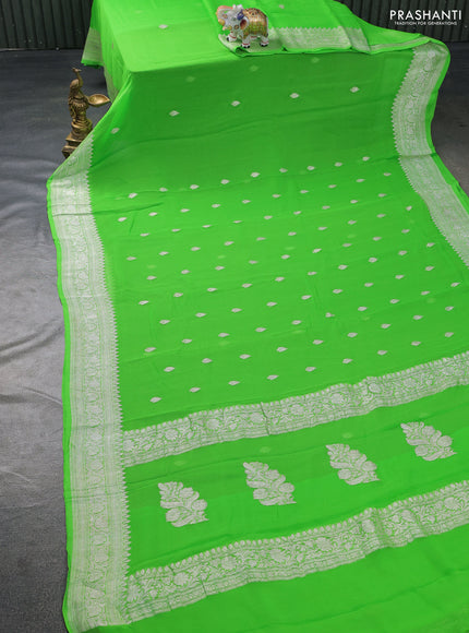Banarasi chiffon silk saree light green with silver zari woven buttas and silver zari woven border