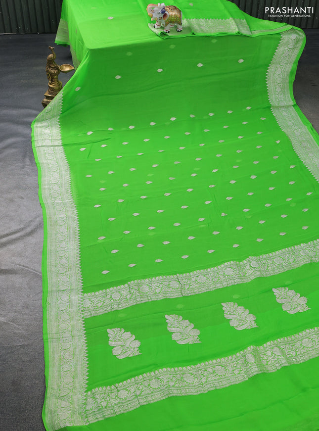 Banarasi chiffon silk saree light green with silver zari woven buttas and silver zari woven border