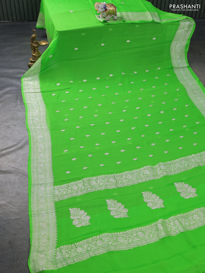 Banarasi chiffon silk saree light green with silver zari woven buttas and silver zari woven border