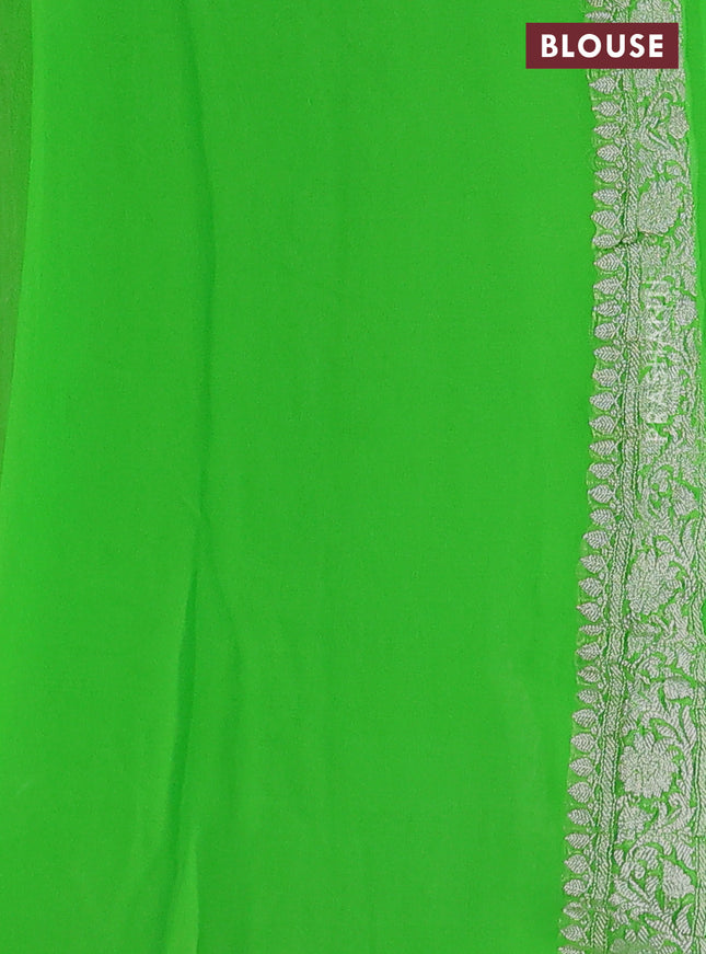 Banarasi chiffon silk saree light green with silver zari woven buttas and silver zari woven border