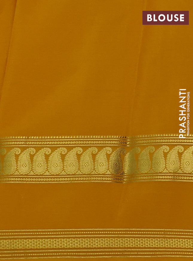 Pure mysore silk saree pale yellow and mango yellow with allover floral prints and rettapet zari woven border