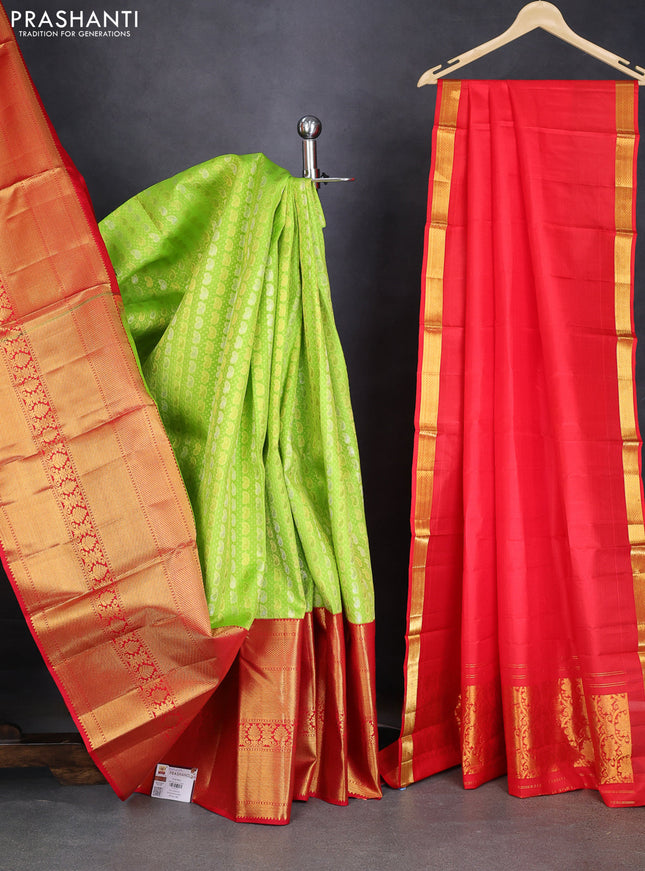 Pure kanchipuram silk lehenga light green and red with allover self emboss & paisley zari weaves and long rich zari woven border