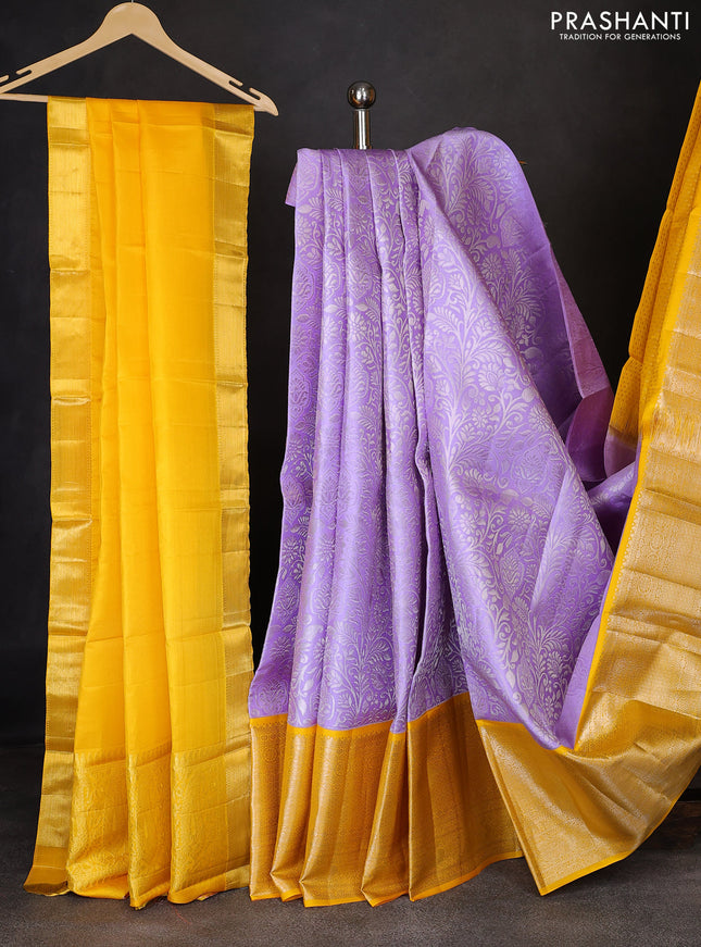 Pure kanchipuram silk lehenga lavender and yellow with allover silver zari woven broacde weaves and long zari woven border