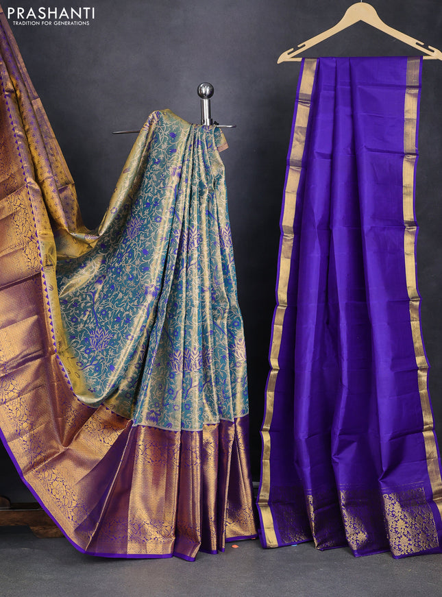 Pure kanchipuram tissue silk lehenga dual shade of teal and blue with allover zari woven broacde weaves and long rich zari woven floral border