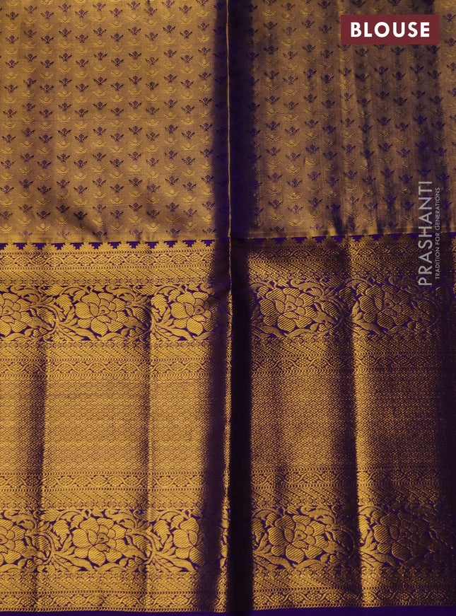 Pure kanchipuram tissue silk lehenga dual shade of teal and blue with allover zari woven broacde weaves and long rich zari woven floral border