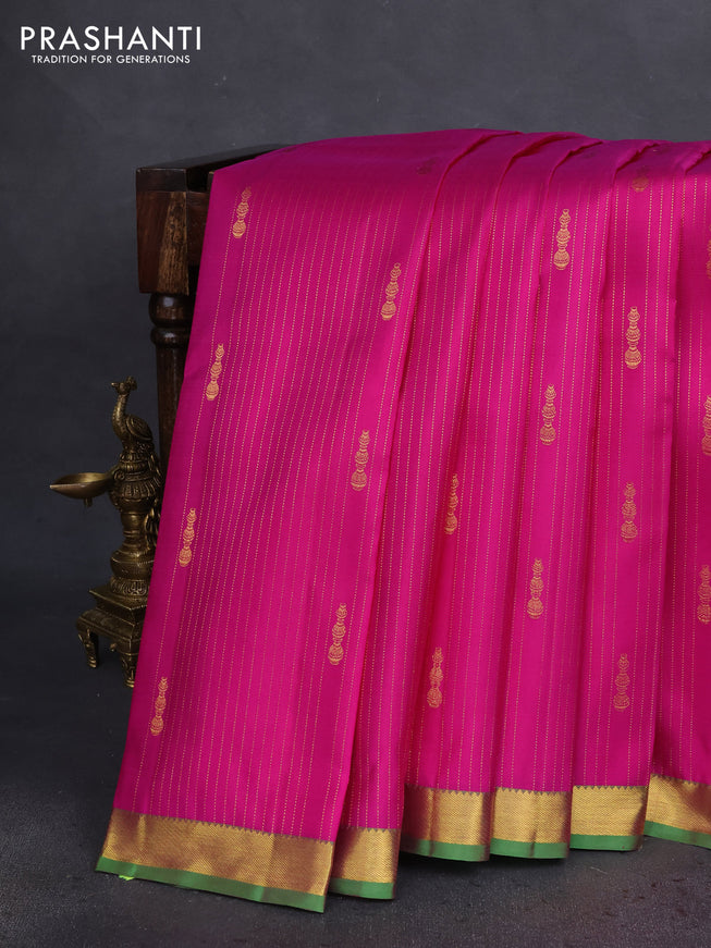 Pure kanchipuram silk saree pink and green with allover zari weaves & butttas and zari woven border
