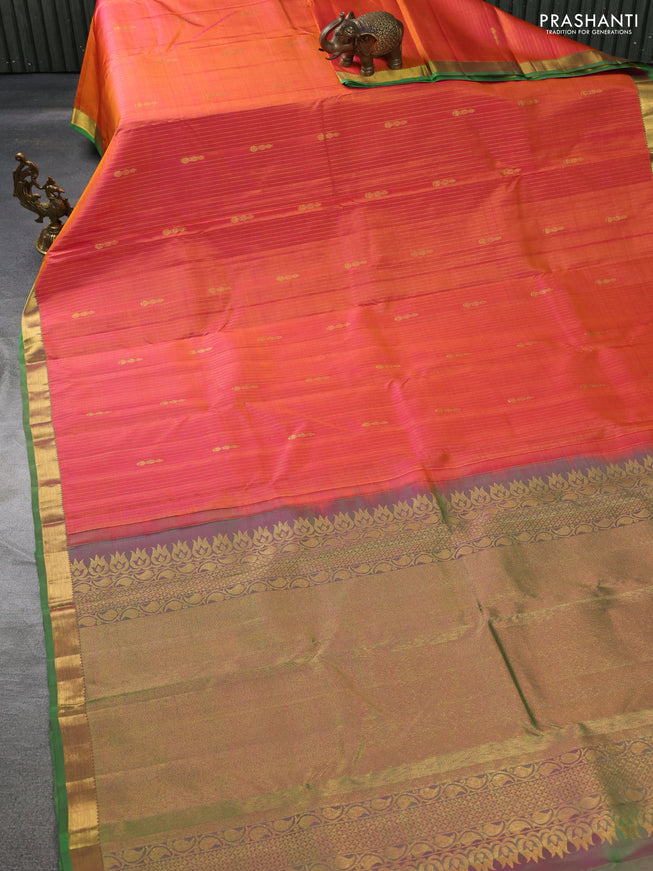 Pure kanchipuram silk saree dual shade of pinkish orange and green with allover zari weaves & butttas and zari woven border