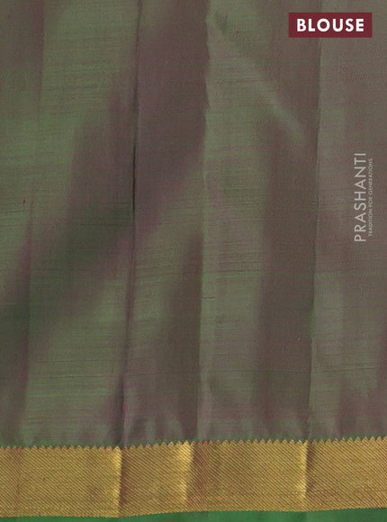 Pure kanchipuram silk saree dual shade of pinkish orange and green with allover zari weaves & butttas and zari woven border