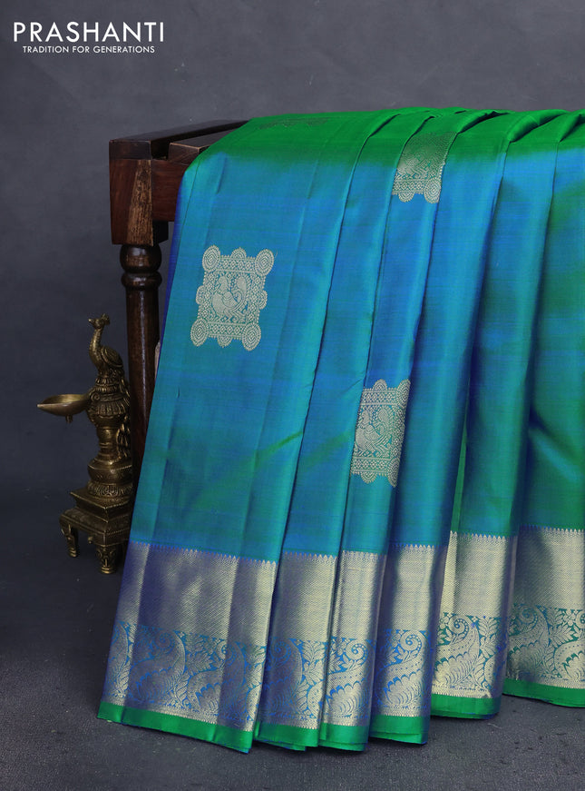 Pure kanchipuram silk saree dual shade of bluish green and royal blue with zari woven annam buttas and zari woven border