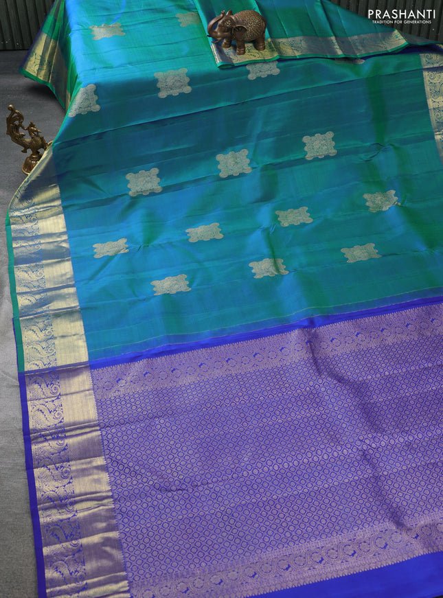 Pure kanchipuram silk saree dual shade of bluish green and royal blue with zari woven annam buttas and zari woven border