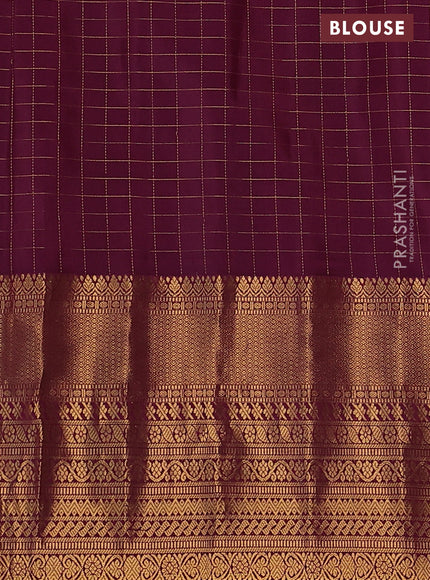 Pure gadwal silk saree light blue and wine shade with allover zari checks & buttas and long zari woven border